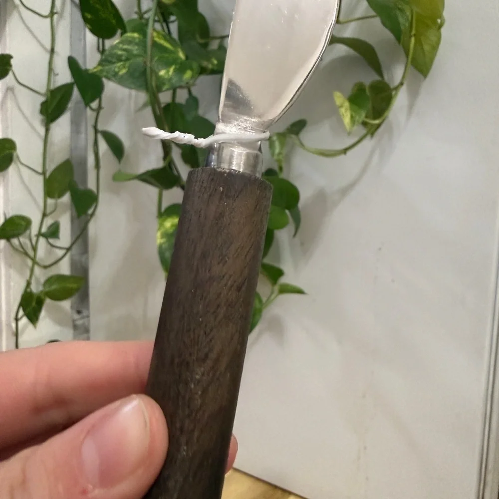 Silver and Brown Spreader Knife